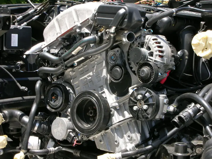Close-up of an engine's belts and pulleys
