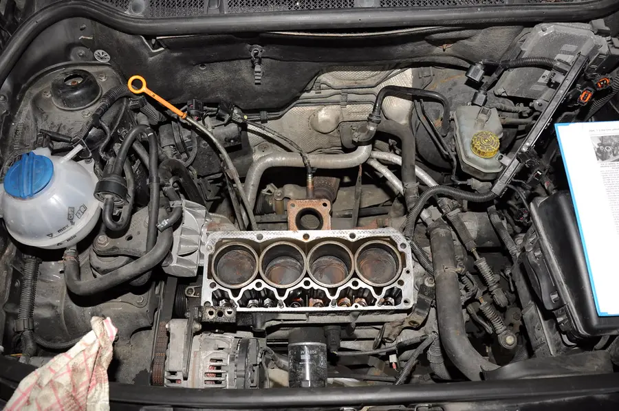 A car engine with the cylinder head removed