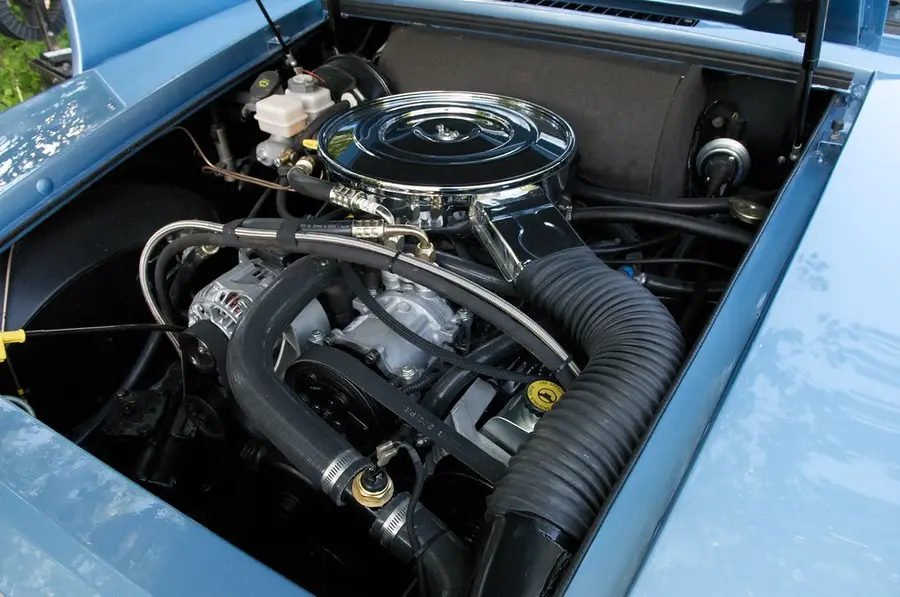 A V8 engine under an open hood